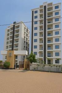 two tall buildings in front of a building at cloud nine in Boria Kalān