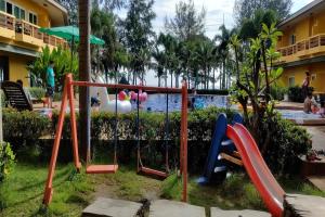 a playground in a resort with a pool at Bacchus Home Resort Pranburi in Ban Pak Nam Pran