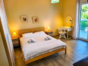 Voodi või voodid majutusasutuse Salamina Summer Nest toas