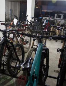 a bunch of bikes parked in a garage at Hotel Grant Ruiseñor in Chambo
