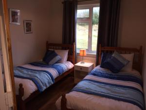 Postel nebo postele na pokoji v ubytování Hillcrest Holiday Home