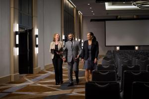 a man and two women standing in a conference room at Hyatt Regency Washington on Capitol Hill in Washington, D.C. +74 photos