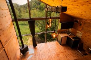 an overhead view of a kitchen in a tree house at Asket Villas in Krivorovnya