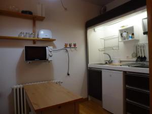 Kuchyňa alebo kuchynka v ubytovaní Apartment La Molina