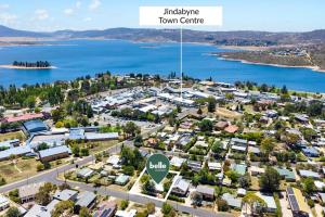 an aerial view of a town with a lake at Rock On Studio in Jindabyne +1 photo