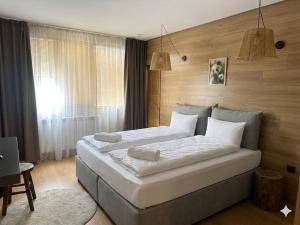 a bedroom with two beds in a room at комплекс Иван и Петър in Belitsa