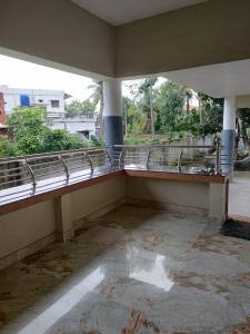 an empty balcony of a building with a view at Bridgettine Paradise 2 in Kalpetta