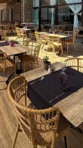 a table with a black napkin on top at Hôtel La Lagune in Lucciana +23 photos