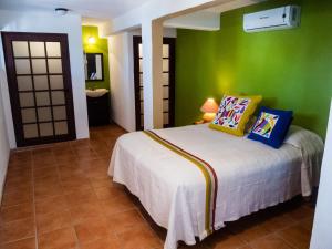 La Posada Del Tepeyac tesisinde bir odada yatak veya yataklar