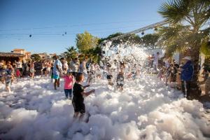 a group of children playing in a cloud garden at Camping La Clape Village in Cap d'Agde