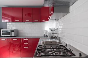Kuchyňa alebo kuchynka v ubytovaní Apartament Zacisze Tatr