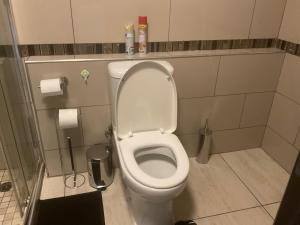 a bathroom with a white toilet in a stall at Katima VVIP in Katima Mulilo +10 photos