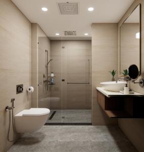 ein Badezimmer mit Toilette, zwei Waschbecken und Dusche in der Unterkunft Ginger Siwan in Siwān + 11 Fotos