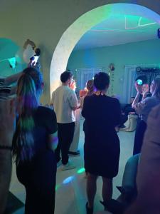 a group of people standing in a room at Mathias Lovasudvar in Kemence
