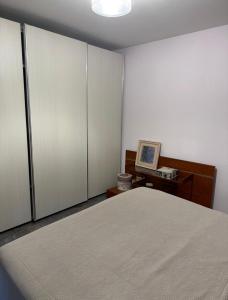 เตียงในห้องที่ Loretino