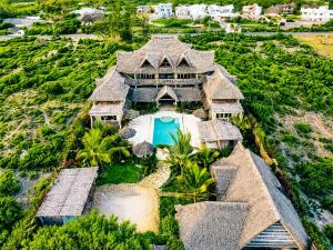 an aerial view of a house with a swimming pool at Ocean zuri villa in Watamu