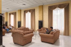 a group of people sitting in a waiting room at Ani Grand Hotel Yerevan in Yerevan