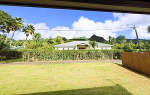 a view of a house from the yard at Kuki Kainga in Matavera