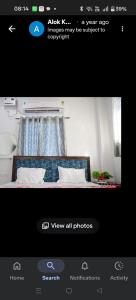 a picture of a bedroom with a bed in a room at Hotel ram priya in Chhatarpur