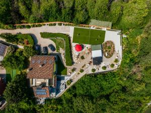 an overhead view of a house with a yard at Villa Spa Chiara Luna by Lago Reisen in Oggebio +56 photos
