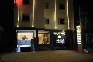 a store front of a building at night at Galaxy Air Suites in Bangalore