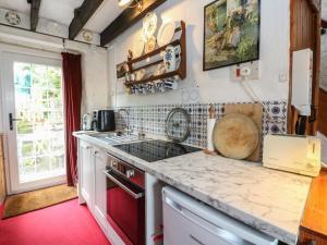 a kitchen with a sink and a counter top at 4 Whiterow in Appin