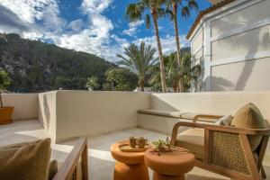 a balcony with a view of a mountain at ZEM Wellness Clinic Altea - 5 Stars Grand Luxury in Altea