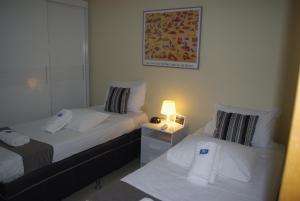 Cama ou camas em um quarto em Apartment Djalma Ulrich