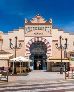 a large building with a sign that reads neederbeckbeck at Finca Tolomó in Aspe