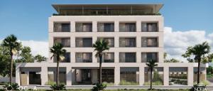 a building with palm trees in front of it at The Noria Hotel in Arsuz