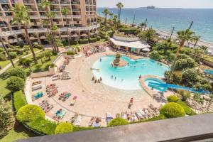 an overhead view of a swimming pool at a resort at Résidence La Palme d’Azur – Cannes in Cannes