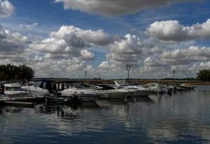 a bunch of boats are docked in the water at Gîte Aux 3 Épis, Classé 3 Étoiles in Dienville