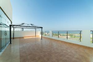 a large room with a view of the ocean at Sidra Serviced Apartments - سدرا للشقق المخدومة in Al Khobar