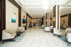 a rendering of a hospital lobby with chairs and tables at جولدن بوجاري الضيافه in Khamis Mushayt