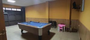 a billiard room with a pool table in it at Casa Rural Arroyo 5 in Mejorada