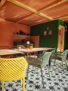 a dining room with a table and chairs at Vikendica Jagodica in Ivanjica