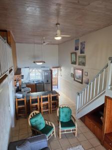 a kitchen and living room with a table and chairs at Unit 9 The Beachfront in Ramsgate