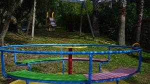 a colorful trampoline in a yard at Il Falco del Cilento in Torchiara