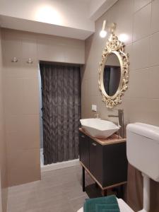 a bathroom with a sink and a mirror at Domus Mater in Vigonza