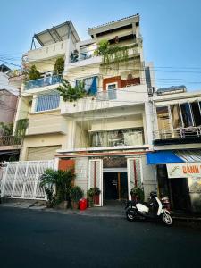 a scooter parked in front of a building at Annie.homestay 12NM in Nha Trang