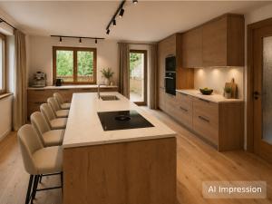 a kitchen with a large island in the middle at Haus Lina in See