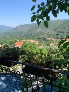 a view of the mountains from a balcony at Il Carpino - Dimora Fresca e parcheggio in Carpineto Romano