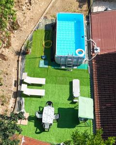 an overhead view of a yard with a swimming pool at Locanda di Cornoleda in Cinto Euganeo