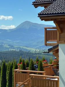 a balcony with a view of the mountains at Villa Bergbliss in Bukovel