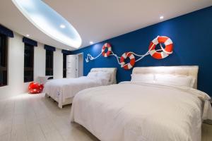Krevet ili kreveti u jedinici u okviru objekta Shell Sand Homestay