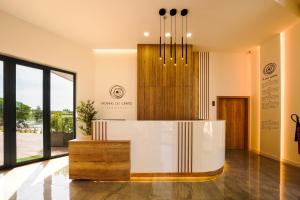 a lobby with a reception desk in a building at Moinho do Canto Residence Hotel in Rio Maior