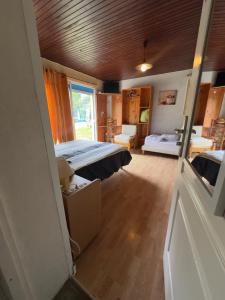 a bedroom with a bed in a room at Aux Châtaigniers in Langon +20 photos
