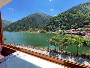 a view of a river from a window at Osmanlı Suite in Uzungöl