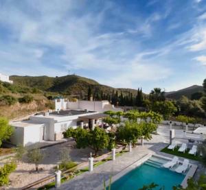 an aerial view of a resort with a swimming pool at Villa Karma in Berja