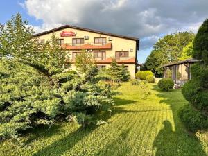 a house with a garden in front of it at TROPHAEUM TRAIANI in Adamclisi